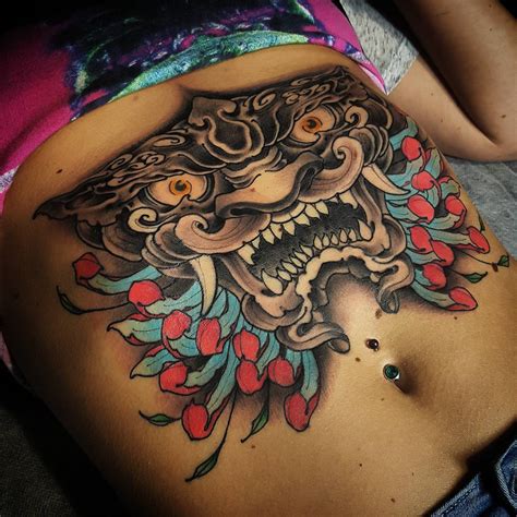 women stomach tattoos